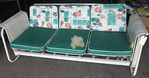 courtesy http://www.ebay.com/itm/VINTAGE-MODERN-MID-CENTURY-GLIDER-COUCH-SOFA-SWING-/190896430895